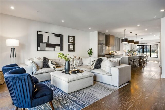 726 Edgewood Ave NE, Atlanta, GA 30307 - living area with recessed lighting and dark wood-style flooring
