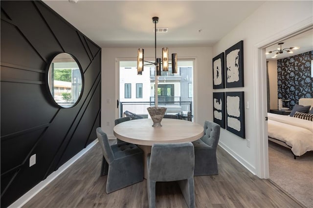 392 Pratt Dr Unit 2014, Atlanta, GA 30315 - dining area with a chandelier and dark wood-type flooring