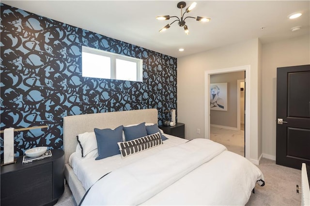 392 Pratt Dr Unit 2014, Atlanta, GA 30315 - bedroom featuring a chandelier, wallpapered walls, an accent wall, carpet, and recessed lighting
