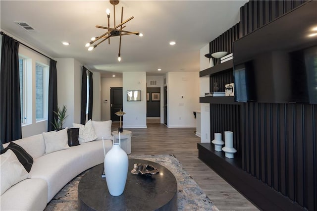 392 Pratt Dr Unit 2014, Atlanta, GA 30315 - living room featuring light wood finished floors, a chandelier, and recessed lighting