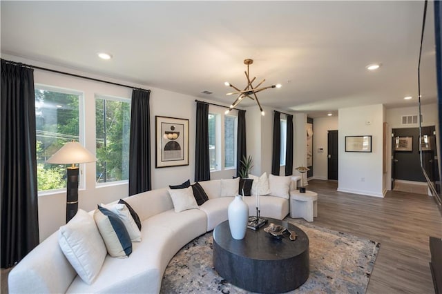 392 Pratt Dr Unit 2014, Atlanta, GA 30315 - living room with a chandelier, wood finished floors, and recessed lighting