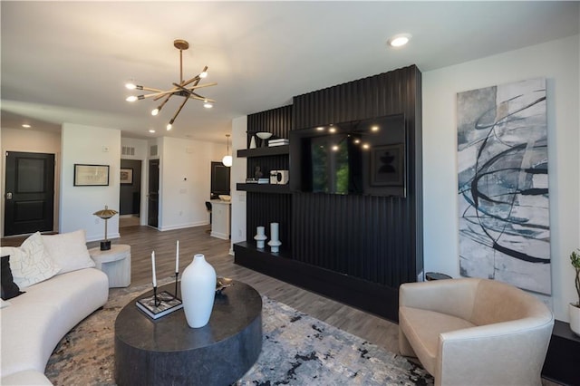 392 Pratt Dr Unit 2014, Atlanta, GA 30315 - living area featuring a chandelier, wood finished floors, and recessed lighting