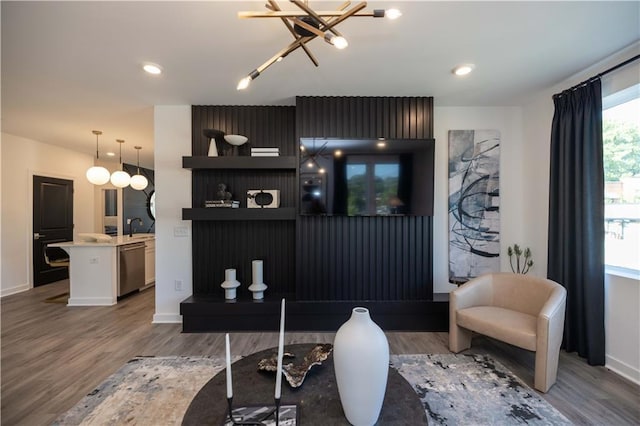 392 Pratt Dr Unit 2014, Atlanta, GA 30315 - living room featuring wood finished floors and a chandelier