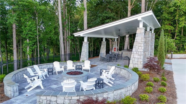 view of patio / terrace with a gazebo and an outdoor fire pit