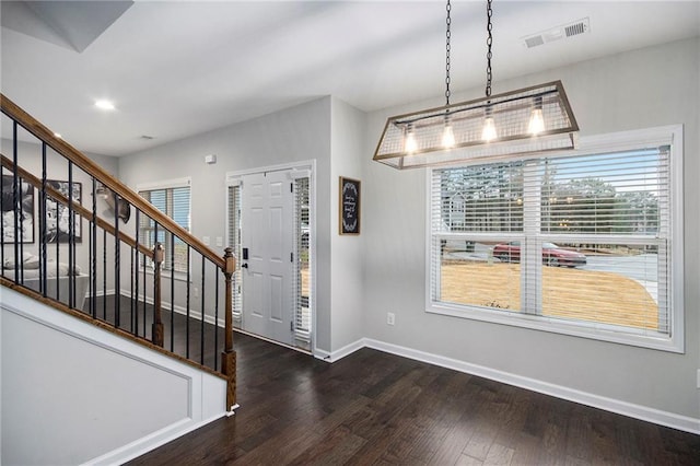 entrance foyer with dark wood-type flooring