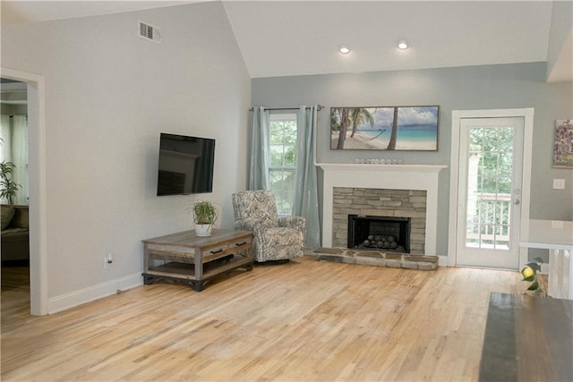6985 Shane Ln, Cumming, GA 30028 - living room with vaulted ceiling, wood finished floors, healthy amount of natural light, baseboards, and recessed lighting