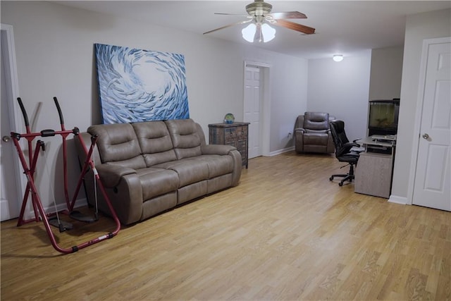 6985 Shane Ln, Cumming, GA 30028 - office area with light wood-type flooring, ceiling fan, and baseboards