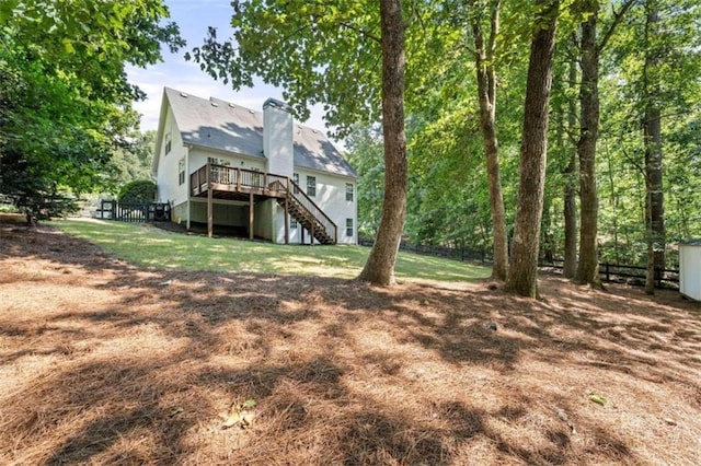 6985 Shane Ln, Cumming, GA 30028 - rear view of property with stairs, a deck, and a chimney