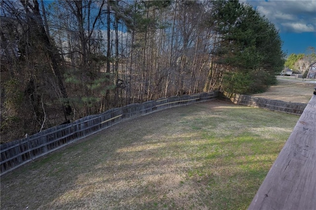 view of yard with a fenced backyard