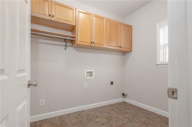 washroom featuring cabinet space, baseboards, washer hookup, and electric dryer hookup