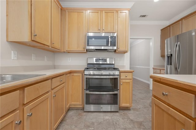 kitchen featuring stainless steel appliances, light countertops, visible vents, and crown molding