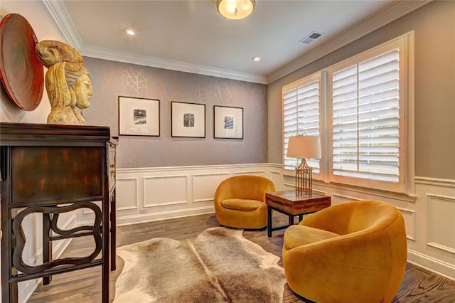 13 Clearwater Ct, Hoschton, GA 30548 - sitting room featuring ornamental molding, wood finished floors, a wainscoted wall, a decorative wall, and recessed lighting