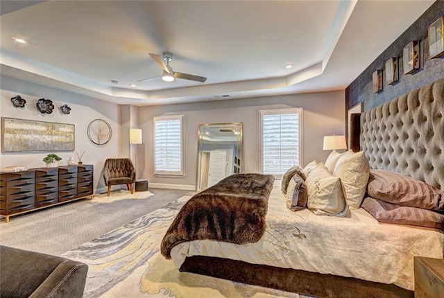 13 Clearwater Ct, Hoschton, GA 30548 - bedroom with a raised ceiling, carpet flooring, baseboards, recessed lighting, and a ceiling fan