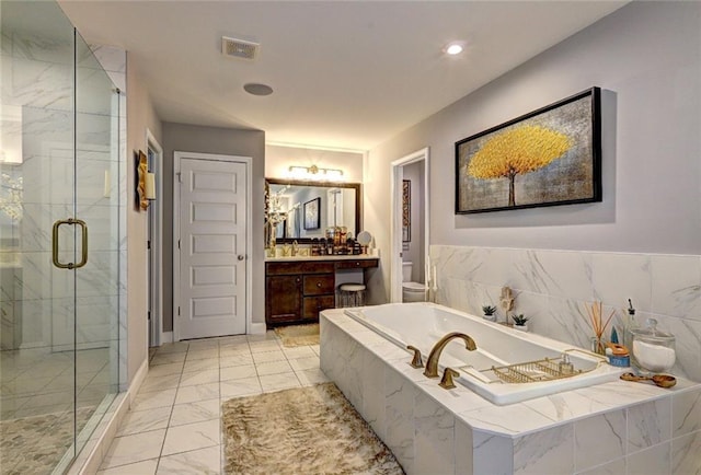 13 Clearwater Ct, Hoschton, GA 30548 - full bath with toilet, vanity, a garden tub, a marble finish shower, and marble finish floors