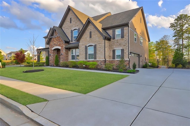 13 Clearwater Ct, Hoschton, GA 30548 - view of front of home featuring stone siding, concrete driveway, and an attached garage