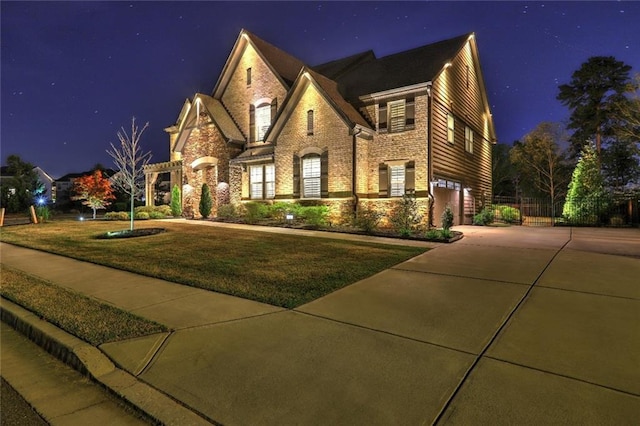 13 Clearwater Ct, Hoschton, GA 30548 - view of front of house with stone siding, driveway, and a garage