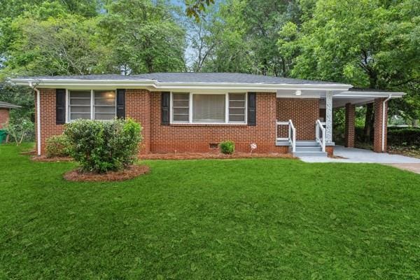 2858 Valley Ridge Dr, Decatur, GA 30032 - ranch-style home with a front yard, driveway, and brick siding