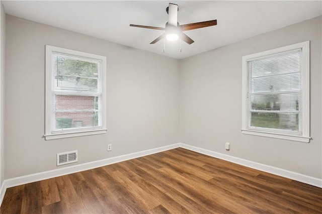 2858 Valley Ridge Dr, Decatur, GA 30032 - spare room featuring baseboards, wood finished floors, and a ceiling fan