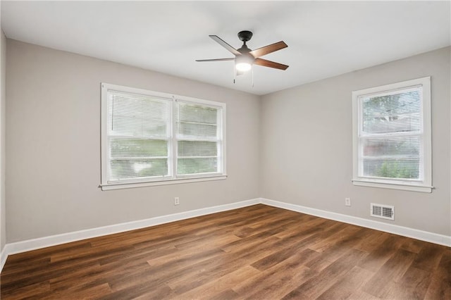 2858 Valley Ridge Dr, Decatur, GA 30032 - unfurnished room featuring healthy amount of natural light, wood finished floors, ceiling fan, and baseboards
