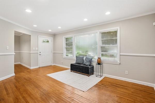 2858 Valley Ridge Dr, Decatur, GA 30032 - sitting room featuring ornamental molding, wood finished floors, baseboards, and recessed lighting