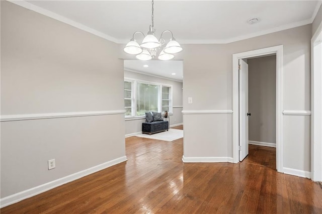 2858 Valley Ridge Dr, Decatur, GA 30032 - empty room with a chandelier, crown molding, wood finished floors, baseboards, and a smoke detector