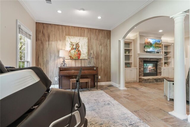 3578 Hope Rd, Cumming, GA 30041 - living area with decorative columns, arched walkways, baseboards, and ornamental molding