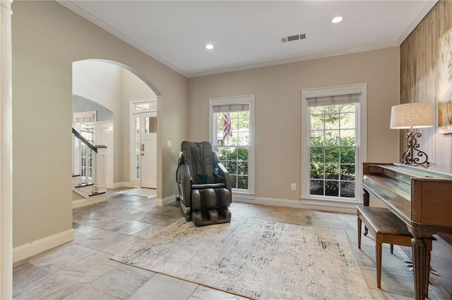3578 Hope Rd, Cumming, GA 30041 - sitting room with ornamental molding, visible vents, baseboards, and arched walkways