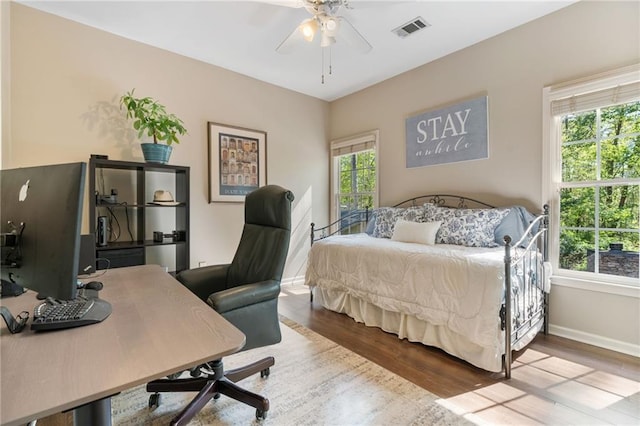 3578 Hope Rd, Cumming, GA 30041 - bedroom featuring visible vents, baseboards, a ceiling fan, and wood finished floors