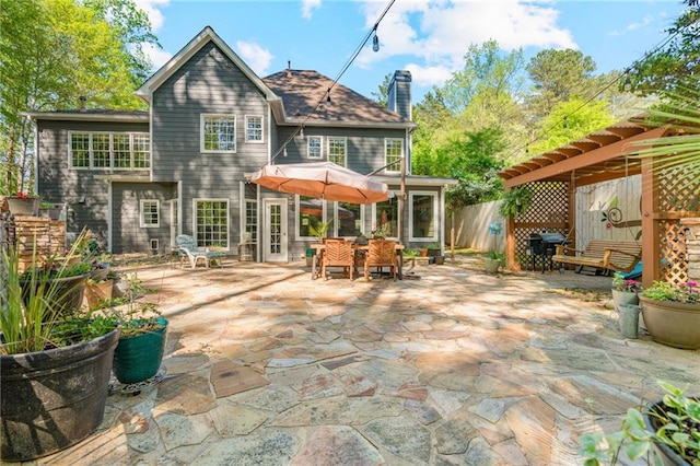 3578 Hope Rd, Cumming, GA 30041 - back of property featuring fence, a patio, and a chimney