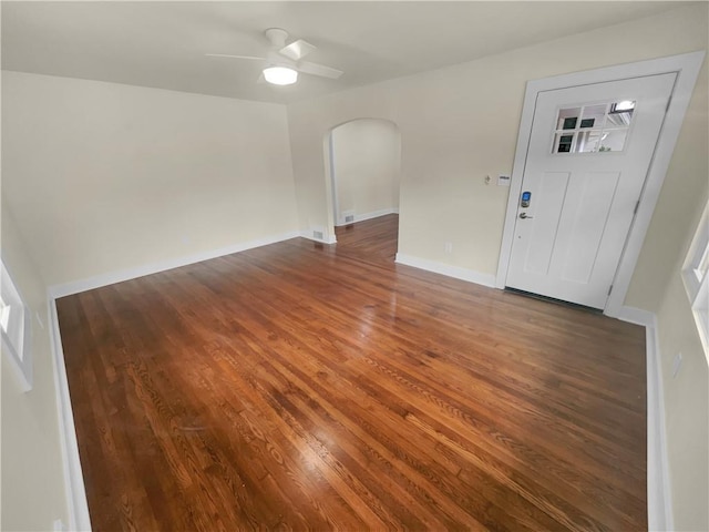 1955 S Columbia Pl, Decatur, GA 30032 - interior space with arched walkways, baseboards, a ceiling fan, and wood finished floors