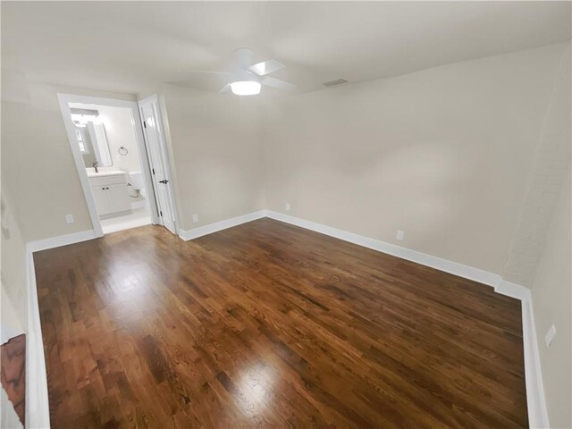 1955 S Columbia Pl, Decatur, GA 30032 - spare room with visible vents, baseboards, dark wood-type flooring, and a ceiling fan