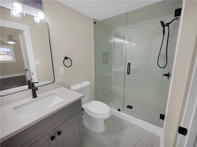 1955 S Columbia Pl, Decatur, GA 30032 - bathroom featuring marble finish floor, a stall shower, toilet, and vanity