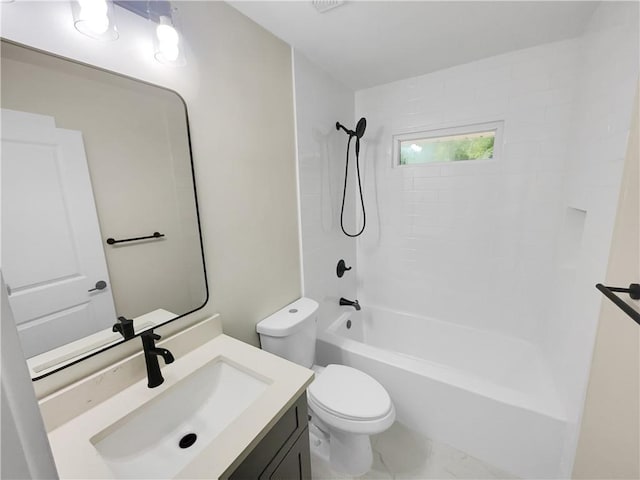 1955 S Columbia Pl, Decatur, GA 30032 - full bath featuring vanity, bathing tub / shower combination, toilet, and marble finish floor