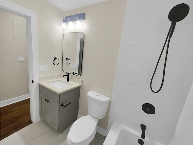 1955 S Columbia Pl, Decatur, GA 30032 - bathroom featuring baseboards, toilet, wood finished floors, and vanity
