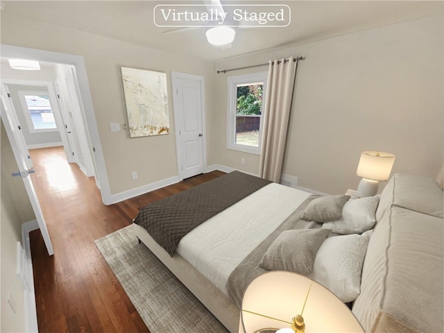 1955 S Columbia Pl, Decatur, GA 30032 - bedroom with dark wood-style floors and baseboards