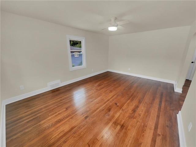 1955 S Columbia Pl, Decatur, GA 30032 - unfurnished room with ceiling fan, visible vents, baseboards, and wood finished floors