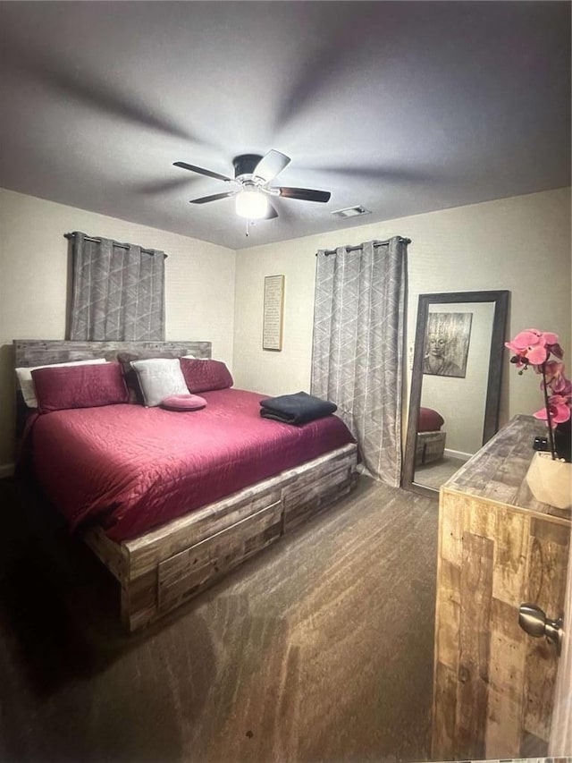 1132 SE Oak Knoll Ter SE, Atlanta, GA 30315 - carpeted bedroom with baseboards and a ceiling fan
