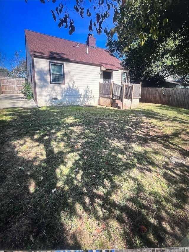1132 SE Oak Knoll Ter SE, Atlanta, GA 30315 - rear view of property featuring a chimney and crawl space