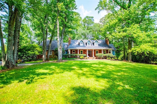 3187 Oak Grove Church Rd, Carrollton, GA 30117 - cape cod house with a front lawn and a chimney