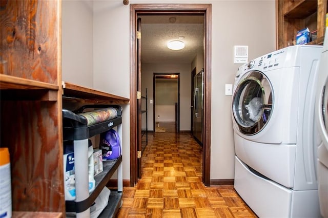 3187 Oak Grove Church Rd, Carrollton, GA 30117 - washroom with washer / dryer, baseboards, and a textured ceiling