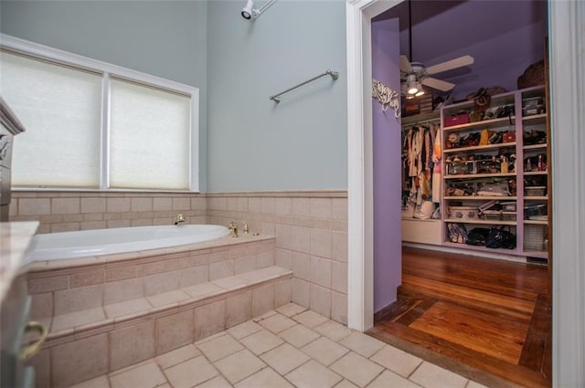3187 Oak Grove Church Rd, Carrollton, GA 30117 - full bath with a bath, tile patterned floors, a ceiling fan, and a walk in closet