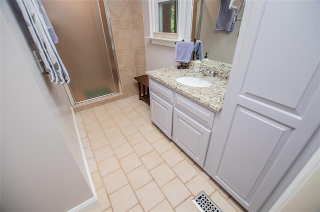 3187 Oak Grove Church Rd, Carrollton, GA 30117 - full bathroom featuring a shower stall, vanity, and tile patterned floors