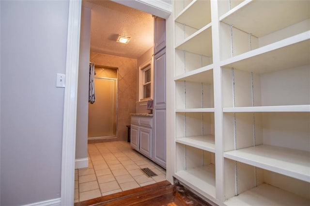 3187 Oak Grove Church Rd, Carrollton, GA 30117 - hall featuring light tile patterned floors