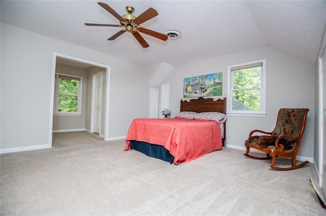 3187 Oak Grove Church Rd, Carrollton, GA 30117 - bedroom featuring multiple windows, carpet flooring, ceiling fan, lofted ceiling, and baseboards