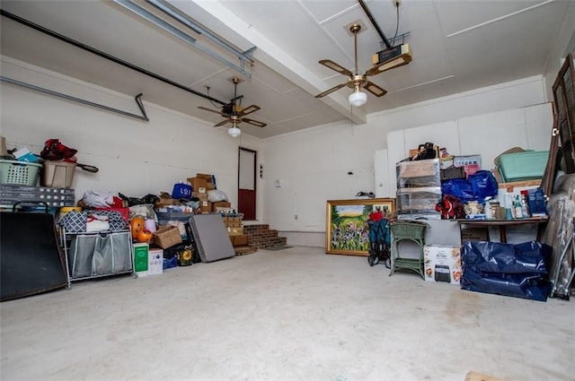 3187 Oak Grove Church Rd, Carrollton, GA 30117 - garage featuring a ceiling fan and a garage door opener