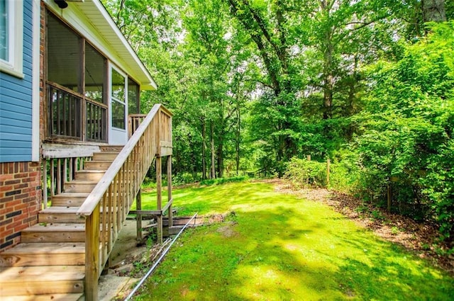 3187 Oak Grove Church Rd, Carrollton, GA 30117 - view of grassy yard featuring a sunroom, stairs, and a forest view