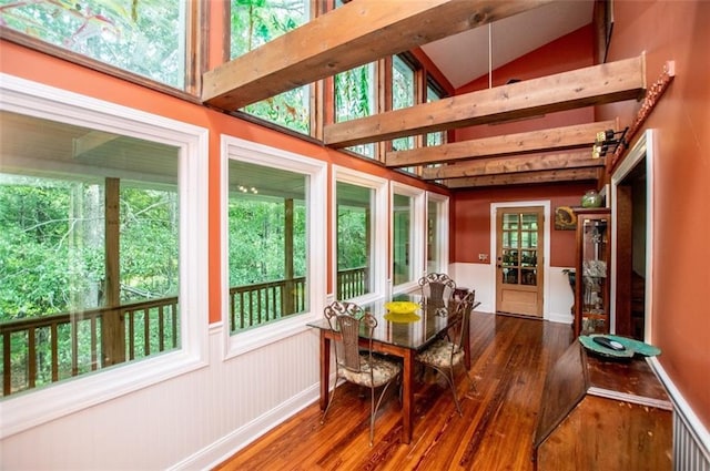 3187 Oak Grove Church Rd, Carrollton, GA 30117 - sunroom with hardwood / wood-style flooring, a wainscoted wall, healthy amount of natural light, lofted ceiling, and a wooden deck