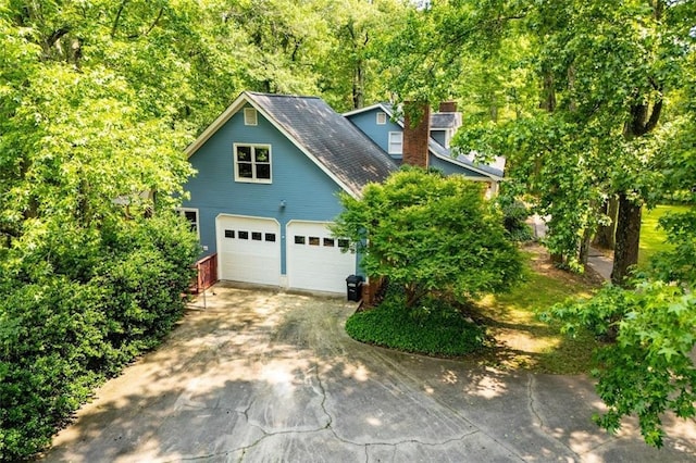 3187 Oak Grove Church Rd, Carrollton, GA 30117 - view of front of house featuring a garage and concrete driveway