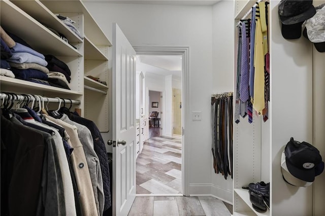 walk in closet featuring light wood-type flooring