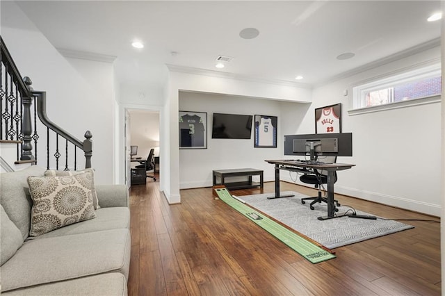 home office with hardwood / wood-style flooring and crown molding